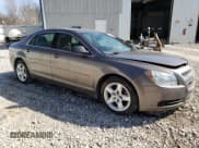 ✅ 2011 Chevrolet Malibu 1LS • VIN: 1G1ZB5E17BF331182 • Lot: 42616344. Listed on Copart with 187,838 mi. Free auction sales archive from the USA and detailed vehicle history report at DreamBid. Image 4.