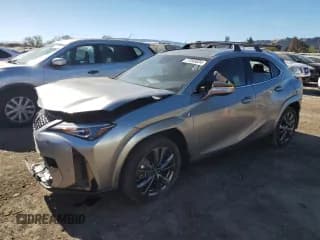 ✅ 2022 Lexus UX 250h F Sport • VIN: JTHE9JBH2N2062143 • Lot: 77345634. Listed on Copart with 13,118 mi. Free auction sales archive from the USA and detailed vehicle history report at DreamBid. Image 1.
