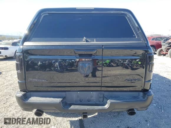 2020 Ram 1500 Rebel z VIN 1C6SRFLM6LN286161, wystawiony jako Copart lot #61503965 z przebiegiem 119 391 mil mil oraz Szkoda całkowita • Salvage title. Historia ofert i sprzedaży dostępna na DreamBid. Obrazek 6.