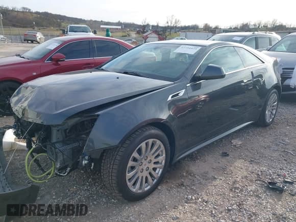✅ 2014 Cadillac CTS Premium • VIN: 1G6DH1E33E0114524 • Lot: 43754425. Listed on IAAI with 41,298 mi. Free auction sales archive from the USA and detailed vehicle history report at DreamBid. Image 2.