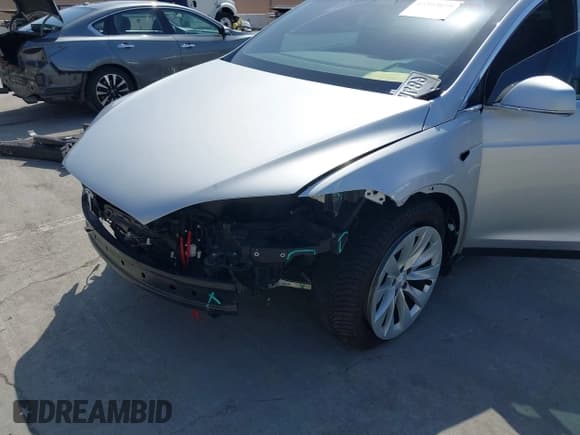 ✅ 2018 Tesla Model X 75D • VIN: 5YJXCDE26JF114207 • Lot: 42397839. Listed on IAAI with Not provided. Free auction sales archive from the USA and detailed vehicle history report at DreamBid. Image 6.