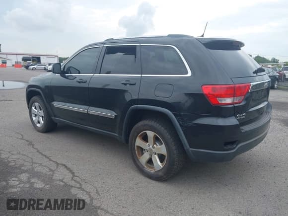 ✅ 2013 Jeep Grand Cherokee Laredo • VIN: 1C4RJFAG7DC502043 • Lot: 42667945. Listed on IAAI with 149,543 mi. Free auction sales archive from the USA and detailed vehicle history report at DreamBid. Image 3.