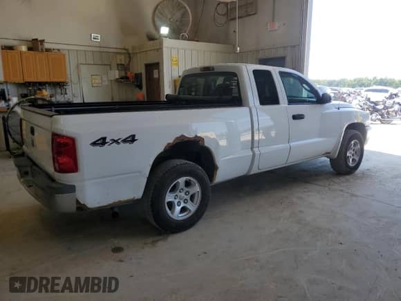 2006 Dodge Dakota SLT с VIN 1D7HW42K96S579208, выставлен на аукционе Copart как лот 71699414 с пробегом 178 506 миль миль и Чистый • Clean title. История ставок и продаж доступна на DreamBid. Изображение 3.