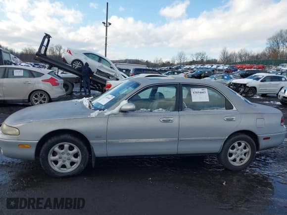 ✅ 1995 Mazda 626 • VIN: 1YVGE22D1S5309021 • Lot: 43854603. Listed on IAAI with 97,053 mi. Free auction sales archive from the USA and detailed vehicle history report at DreamBid. Image 6.