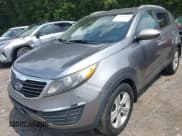 ✅ 2012 Kia Sportage LX • VIN: KNDPB3A21C7300457 • Lot: 42987826. Listed on IAAI with 233,371 mi. Free auction sales archive from the USA and detailed vehicle history report at DreamBid. Image 6.