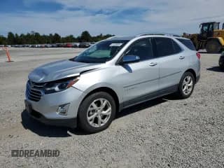 ✅ 2018 Chevrolet Equinox Premier • VIN: 2GNAXVEVXJ6306270 • Лот: 81335055. Опубликован ранее на Copart с пробегом 59 088 миль. Бесплатный доступ к архиву аукционных продаж из США и подробный отчёт об истории автомобиля на DreamBid. Изображение 1.