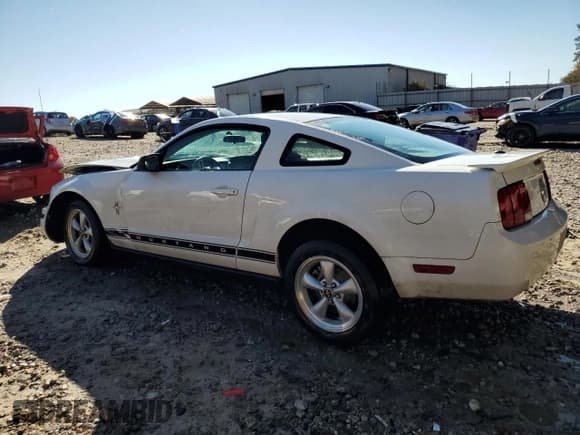 ✅ 2007 Ford Mustang Deluxe • VIN: 1ZVFT80N675295675 • Лот: 91176335. Опубликован ранее на Copart с пробегом 141 739 миль. Бесплатный доступ к архиву аукционных продаж из США и подробный отчёт об истории автомобиля на DreamBid. Изображение 2.
