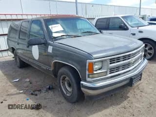 ✅ 1999 Chevrolet Suburban • VIN: 1GNEC16R9XJ502770 • Lot: 42000467. Listed on IAAI with 245,844 mi. Free auction sales archive from the USA and detailed vehicle history report at DreamBid. Image 1.