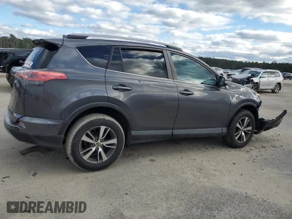 ✅ 2018 Toyota RAV4 XLE • VIN: 2T3WFREV7JW410938 • Лот: 90719435. Опубликован ранее на Copart с пробегом 91 499 миль. Бесплатный доступ к архиву аукционных продаж из США и подробный отчёт об истории автомобиля на DreamBid. Изображение 3.