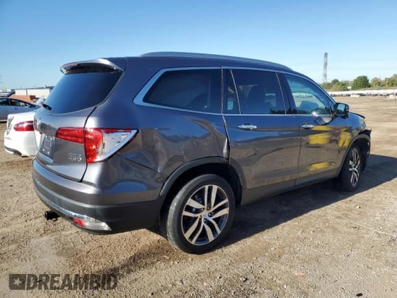 ✅ 2018 Honda Pilot Touring • VIN: 5FNYF6H91JB005668 • Лот: 85587675. Опубликован ранее на Copart с пробегом 104 956 миль. Бесплатный доступ к архиву аукционных продаж из США и подробный отчёт об истории автомобиля на DreamBid. Изображение 3.