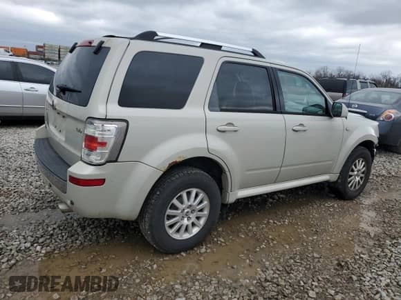 2009 Mercury Mariner Premier with VIN 4M2CU97789KJ11559, listed as a Copart auction lot 50976635 with 152,481 mi miles and Salvage title. Bid and sale history available at DreamBid. Image 3.