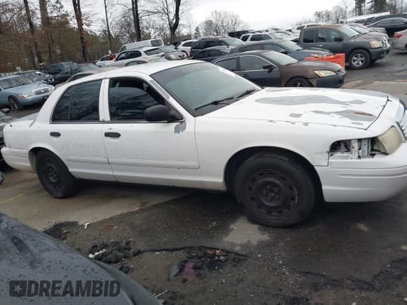 ✅ 2005 Ford Police Interceptor • VIN: 2FAFP71W75X120703 • Lot: 41256222. Listed on IAAI with 208,095 mi. Free auction sales archive from the USA and detailed vehicle history report at DreamBid. Image 13.