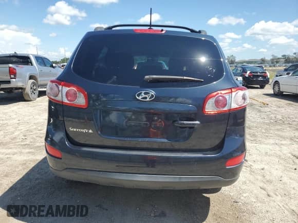 2012 Hyundai Santa Fe GLS с VIN 5XYZG3AB7CG120073, выставлен на аукционе Copart как лот 63723754 с пробегом 136 404 миль миль и Списание • Salvage title. История ставок и продаж доступна на DreamBid. Изображение 6.