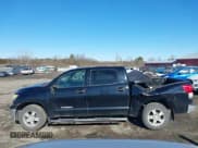 ✅ 2011 Toyota Tundra • VIN: 5TFDM5F18BX023877 • Lot: 41558654. Listed on IAAI with 235,734 mi. Free auction sales archive from the USA and detailed vehicle history report at DreamBid. Image 14.