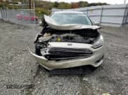 ✅ 2018 Ford Focus Titanium • VIN: 1FADP3J29JL295846 • Lot: 89519975. Wystawiony na Copart z przebiegiem 101 918 mil. Bezpłatny archiwum sprzedaży aukcyjnych z USA i szczegółowy raport historii pojazdu na DreamBid. Zdjęcie 14.