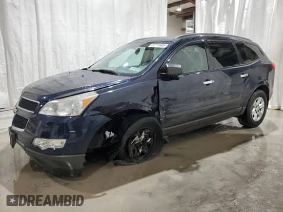 2011 Chevrolet Traverse LS z VIN 1GNKREED6BJ382224, wystawiony jako Copart lot #87210605 z przebiegiem 131 480 mil mil oraz Szkoda całkowita • Salvage title. Historia ofert i sprzedaży dostępna na DreamBid. Obrazek 1.