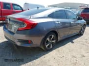 ✅ 2016 Honda Civic Touring • VIN: 19XFC1F90GE031070 • Lot: 43318105. Listed on IAAI with 55,853 mi. Free auction sales archive from the USA and detailed vehicle history report at DreamBid. Image 4.