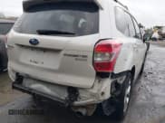 ✅ 2015 Subaru Forester Touring • VIN: JF2SJAWC9FH582396 • Лот: 43702787. Опубликован ранее на IAAI с пробегом 130 365 миль. Бесплатный доступ к архиву аукционных продаж из США и подробный отчёт об истории автомобиля на DreamBid. Изображение 6.
