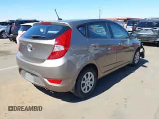 2013 Hyundai Accent GS with VIN KMHCT5AE7DU117306, listed as a IAAI auction lot 43347559 with 104,954 mi miles and . Bid and sale history available at DreamBid. Image 4.
