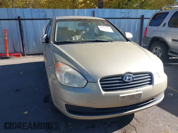 2006 Hyundai Accent GLS z VIN KMHCN46C06U009303, wystawiony jako IAAI lot #43556898 z przebiegiem 186 268 mil mil oraz . Historia ofert i sprzedaży dostępna na DreamBid. Obrazek 6.