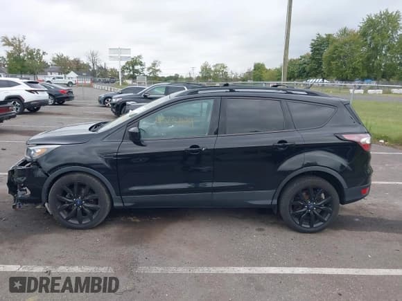 ✅ 2018 Ford Escape SEL • VIN: 1FMCU0HD0JUC55195 • Lot: 43234679. Wystawiony na IAAI z przebiegiem 89 382 mil. Bezpłatny archiwum sprzedaży aukcyjnych z USA i szczegółowy raport historii pojazdu na DreamBid. Zdjęcie 14.