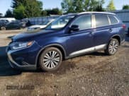 ✅ 2020 Mitsubishi Outlander SE • VIN: JA4AD3A33LZ042935 • Lot: 57334625. Listed on Copart with 89,231 mi. Free auction sales archive from the USA and detailed vehicle history report at DreamBid. Image 1.