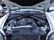 ✅ 2012 BMW X5 35i • VIN: 5UXZV4C55CL759932 • Lot: 91608605. Listed on Copart with 133,084 mi. Free auction sales archive from the USA and detailed vehicle history report at DreamBid. Image 12.