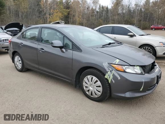 ✅ 2012 Honda Civic LX • VIN: 2HGFB2F56CH036439 • Lot: 90802585. Listed on Copart with 235,571 mi. Free auction sales archive from the USA and detailed vehicle history report at DreamBid. Image 4.