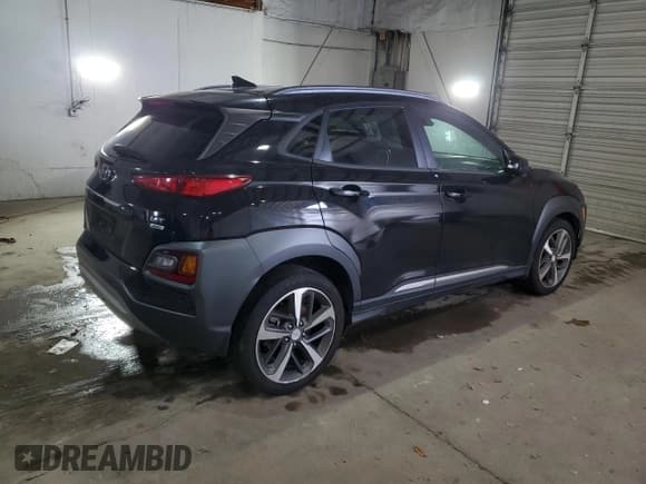 ✅ 2019 Hyundai Kona Ultimate • VIN: KM8K5CA54KU329734 • Lot: 91737215. Listed on Copart with 103,273 mi. Free auction sales archive from the USA and detailed vehicle history report at DreamBid. Image 3.