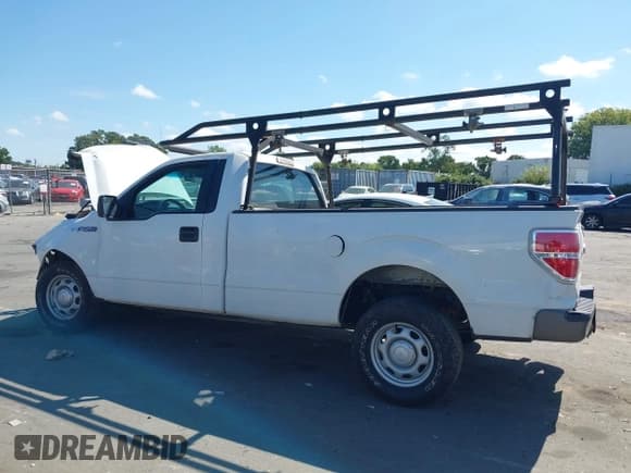✅ 2011 Ford F-150 XL • VIN: 1FTNF1CFXBKD71717 • Lot: 43185498. Listed on IAAI with 201,430 mi. Free auction sales archive from the USA and detailed vehicle history report at DreamBid. Image 14.