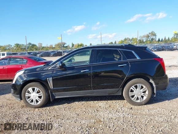✅ 2016 Cadillac SRX Luxury Collection • VIN: 3GYFNEE32GS570414 • Lot: 43403544. Listed on IAAI with 142,993 mi. Free auction sales archive from the USA and detailed vehicle history report at DreamBid. Image 14.