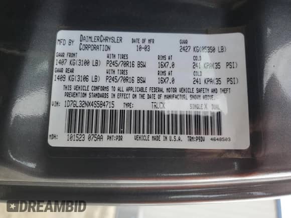 2004 Dodge Dakota Sport z VIN 1D7GL32NX4S584715, wystawiony jako Copart lot #54146225 z przebiegiem Nie podano mil oraz Nie do naprawy • Non repairable. Historia ofert i sprzedaży dostępna na DreamBid. Obrazek 12.