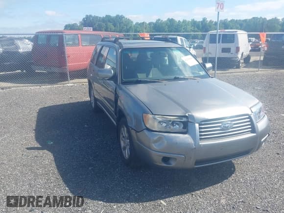 ✅ 2007 Subaru Forester X • VIN: JF1SG65677H740067 • Lot: 42294046. Listed on IAAI with 182,812 mi. Free auction sales archive from the USA and detailed vehicle history report at DreamBid. Image 1.