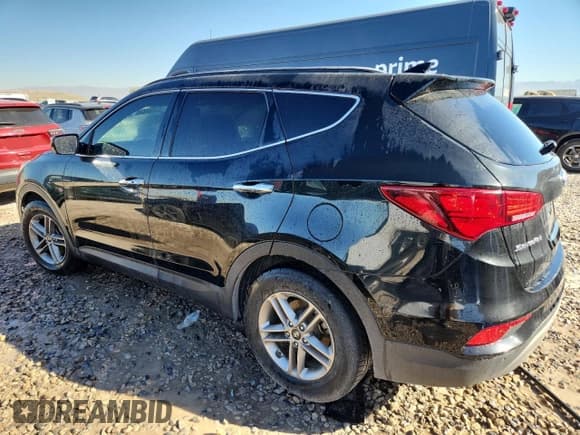 ✅ 2017 Hyundai Santa Fe 2.4L • VIN: 5XYZUDLB3HG462560 • Lot: 89849245. Listed on Copart with 76,475 mi. Free auction sales archive from the USA and detailed vehicle history report at DreamBid. Image 2.