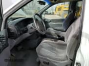 ✅ 1998 Dodge Caravan LE • VIN: 1B4GP54L8WB659336 • Lot: 49106765. Listed on Copart with 202,959 mi. Free auction sales archive from the USA and detailed vehicle history report at DreamBid. Image 7.