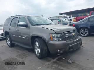 2011 Chevrolet Tahoe LTZ with VIN 1GNSCCE08BR394055, listed as a IAAI auction lot 42171847 with 112,163 mi miles and . Bid and sale history available at DreamBid. Image 1.