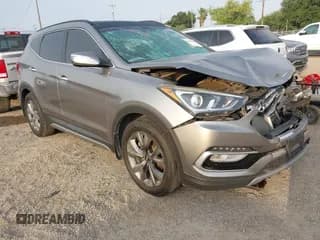 ✅ 2018 Hyundai Santa Fe Ultimate • VIN: 5NMZWDLAXJH100108 • Lot: 42126768. Listed on IAAI with 68,325 mi. Free auction sales archive from the USA and detailed vehicle history report at DreamBid. Image 1.