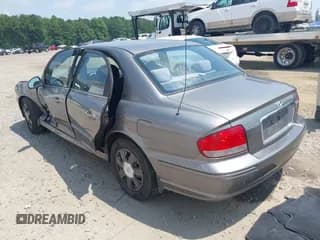 ✅ 2004 Hyundai Sonata • VIN: KMHWF25SX4A033243 • Lot: 42610903. Listed on IAAI with 162,967 mi. Free auction sales archive from the USA and detailed vehicle history report at DreamBid. Image 3.