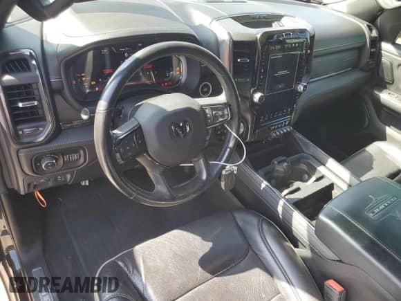 2023 Ram 1500 Limited с VIN 1C6SRFHT7PN540644, выставлен на аукционе Copart как лот 70766875 с пробегом 58 451 миль миль и Списание • Salvage title. История ставок и продаж доступна на DreamBid. Изображение 8.