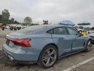 ✅ 2023 Audi e-tron GT Premium Plus • VIN: WAUFJBFW0P7003106 • Лот: 57529125. Опубликован ранее на Copart с пробегом 2 877 миль. Бесплатный доступ к архиву аукционных продаж из США и подробный отчёт об истории автомобиля на DreamBid. Изображение 3.