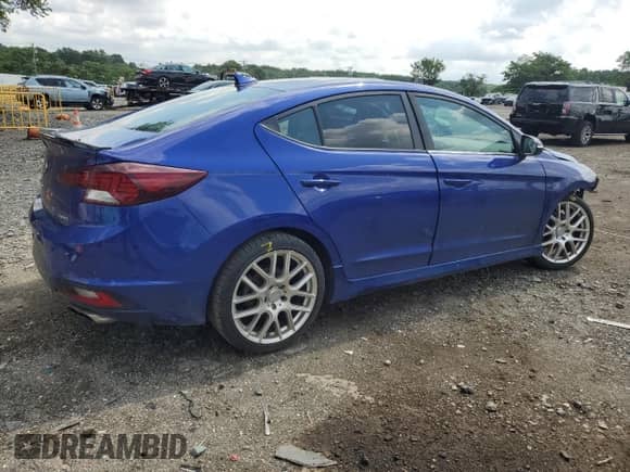 2020 Hyundai Elantra Sport с VIN KMHD04LB1LU040618, выставлен на аукционе Copart как лот 63790695 с пробегом 61 687 миль миль и Списание • Salvage title. История ставок и продаж доступна на DreamBid. Изображение 3.