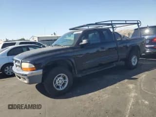 ✅ 1999 Dodge Dakota SLT • VIN: 1B7GG22X6XS166330 • Lot: 63678095. Wystawiony na Copart z przebiegiem 241 272 mil. Bezpłatny archiwum sprzedaży aukcyjnych z USA i szczegółowy raport historii pojazdu na DreamBid. Zdjęcie 1.