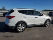 ✅ 2014 Hyundai Santa Fe • VIN: 5XYZU3LA1EG161122 • Lot: 93245155. Listed on Copart with 179,433 mi. Free auction sales archive from the USA and detailed vehicle history report at DreamBid. Image 3.