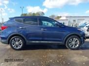 ✅ 2017 Hyundai Santa Fe 2.0T • VIN: 5XYZU4LA6HG401159 • Lot: 43806120. Listed on IAAI with 54,032 mi. Free auction sales archive from the USA and detailed vehicle history report at DreamBid. Image 13.