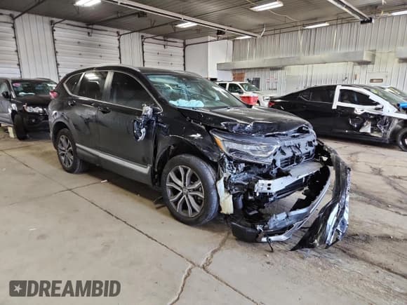 ✅ 2020 Honda CR-V Touring • VIN: 7FART6H9XLE016799 • Лот: 70216275. Опубликован ранее на Copart с пробегом 49 454 миль. Бесплатный доступ к архиву аукционных продаж из США и подробный отчёт об истории автомобиля на DreamBid. Изображение 4.