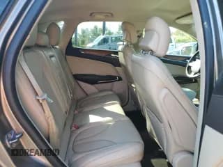 ✅ 2017 Lincoln MKC Select • VIN: 5LMCJ2D98HUL57289 • Lot: 80944775. Listed on Copart with 87,570 mi. Free auction sales archive from the USA and detailed vehicle history report at DreamBid. Image 6.