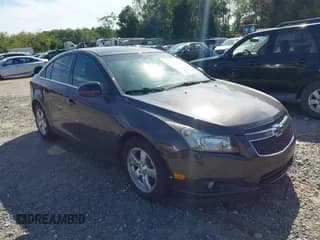 ✅ 2014 Chevrolet Cruze 1LT • VIN: 1G1PC5SB1E7218750 • Lot: 43329530. Listed on IAAI with 151,833 mi. Free auction sales archive from the USA and detailed vehicle history report at DreamBid. Image 1.