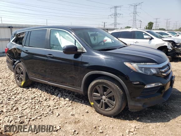 ✅ 2017 Honda Pilot LX • VIN: 5FNYF6H12HB077192 • Lot: 64110395. Listed on Copart with 101,849 mi. Free auction sales archive from the USA and detailed vehicle history report at DreamBid. Image 4.