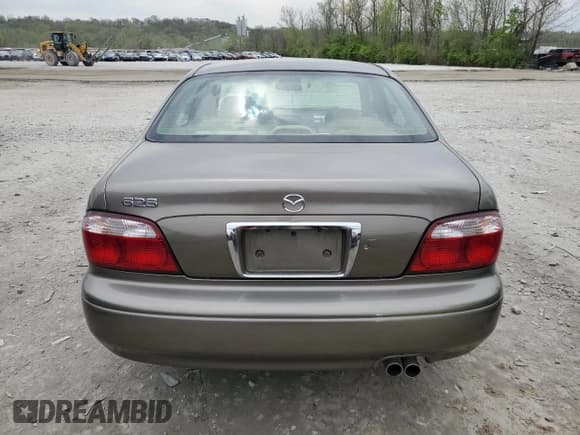 ✅ 2002 Mazda 626 LX • VIN: 1YVGF22D225285499 • Lot: 53693055. Listed on Copart with 144,812 mi. Free auction sales archive from the USA and detailed vehicle history report at DreamBid. Image 6.