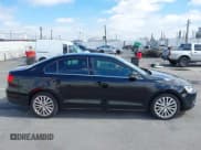 ✅ 2014 Volkswagen Jetta TDI w/Premium/Nav • VIN: 3VWLL7AJ3EM404934 • Lot: 42809693. Listed on IAAI with 142,331 mi. Free auction sales archive from the USA and detailed vehicle history report at DreamBid. Image 13.